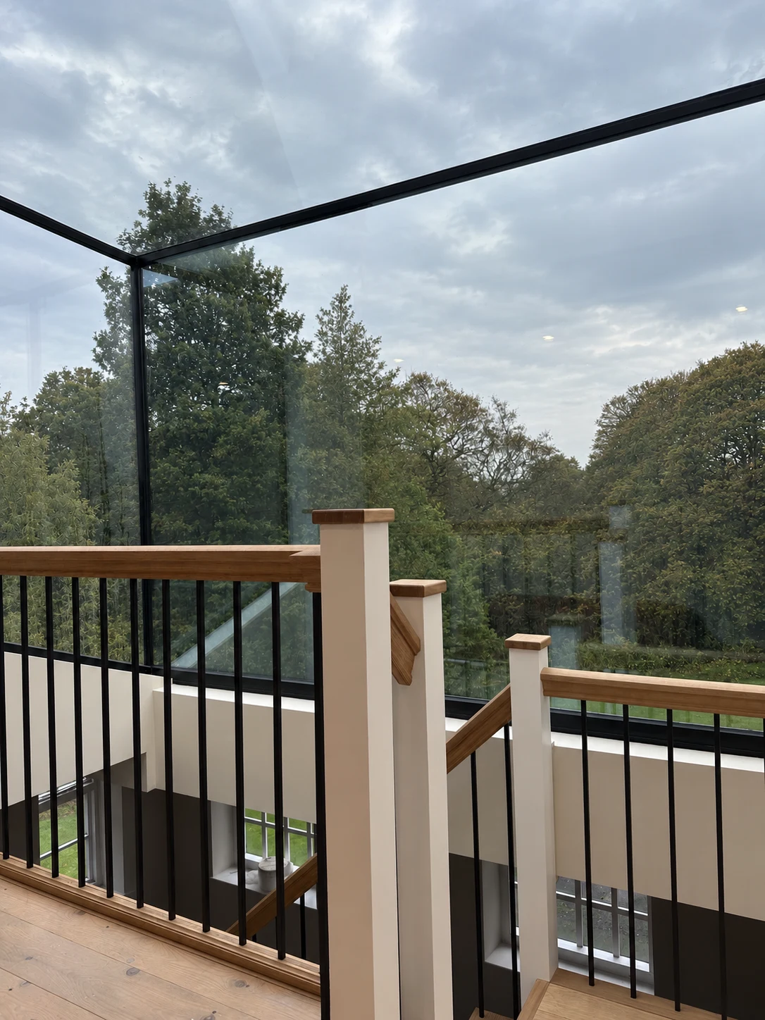 Glass-roof stairwell with natural sky views